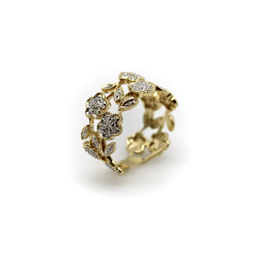 Bague Bague vintage fleurie en filigrane en or 14k et diamants 58 Facettes A20046