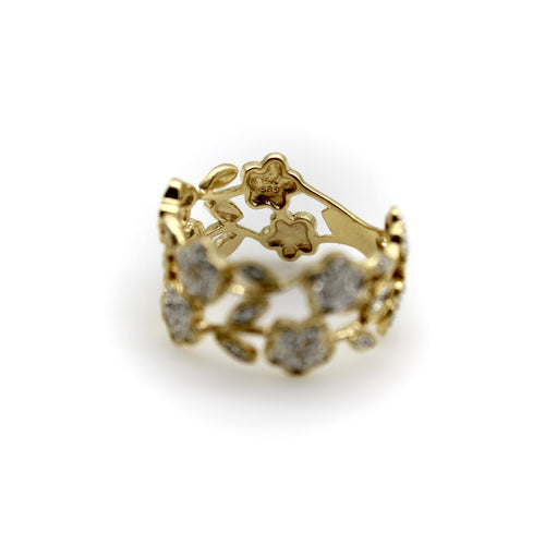 Bague Bague vintage fleurie en filigrane en or 14k et diamants 58 Facettes A20046