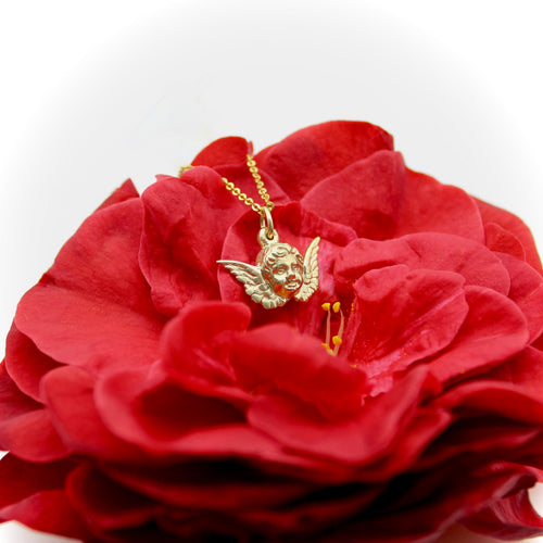 Pendentif Pendentif ou charm chérubin ailé en or 14K 58 Facettes