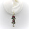 Boucles d'oreilles Giardinetti - Boucles d’oreilles pendantes en argent et or jaune 18k rubis émeraudes perles 58 Facettes