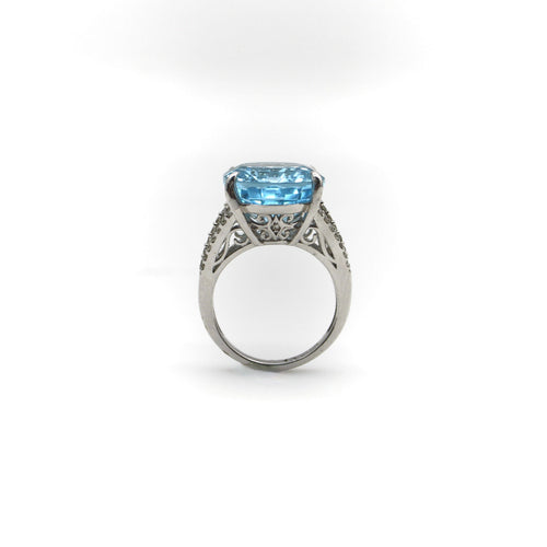 Bague Bague en or blanc 14K avec topaze bleue et diamants 58 Facettes