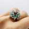 Bague Bague étoile - Cocktail en or blanc et jaune 18k, grenat spessartite, émeraudes et diamants 58 Facettes
