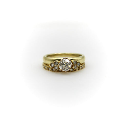 Bague 54 Bague alliance contournée en or jaune 14K avec diamants 58 Facettes