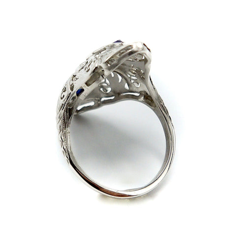 Bague 56 Art déco - Bague navette en or blanc 18 carats, diamants et saphirs 58 Facettes
