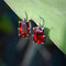 Boucles d'oreilles Boucles d’oreilles vintage - Grenats mandarine en argent et or 18k 58 Facettes