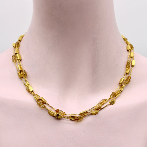 Collier Collier multirangs en or 18 carats et citrines briolettes 58 Facettes
