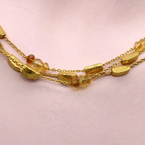 Collier Collier multirangs en or 18 carats et citrines briolettes 58 Facettes