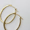 Boucles d'oreilles Boucles d’oreilles créoles ovales pavées de diamants en or 14K 58 Facettes
