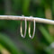Boucles d'oreilles Boucles d’oreilles créoles ovales pavées de diamants en or 14K 58 Facettes