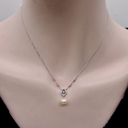 Collier Collier vintage - Perle et diamants pavés en or blanc 14K 58 Facettes A2005N