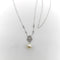 Collier Collier vintage - Perle et diamants pavés en or blanc 14K 58 Facettes A2005N
