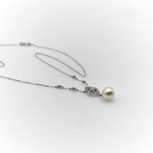 Collier Collier vintage - Perle et diamants pavés en or blanc 14K 58 Facettes A2005N
