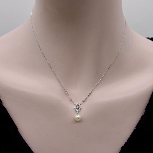 Collier Collier vintage - Perle et diamants pavés en or blanc 14K 58 Facettes A2005N