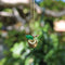 Pendentif Pendentif charm pomme vintage en or 18k, diamants et émail 58 Facettes