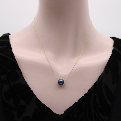 Collier Collier en or 14K avec perle noire des mers du Sud 58 Facettes