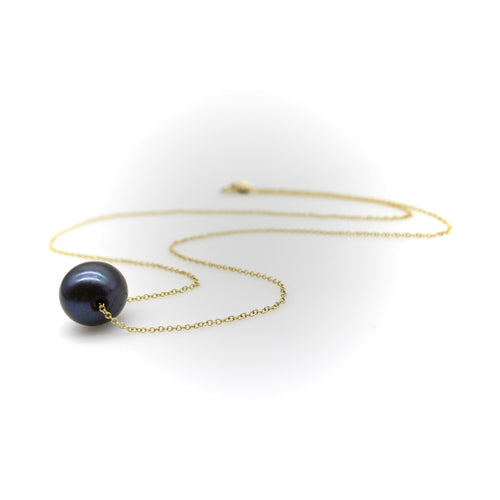 Collier Collier en or 14K avec perle noire des mers du Sud 58 Facettes