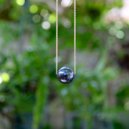 Collier Collier en or 14K avec perle noire des mers du Sud 58 Facettes