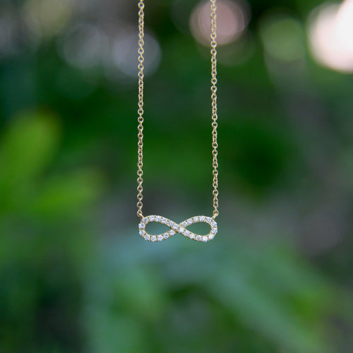 Collier Collier infini en or jaune 18 carats et diamants 58 Facettes