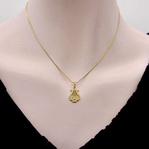 Pendentif Pendentif charm lyre victorien en or 14K 58 Facettes A1000Q