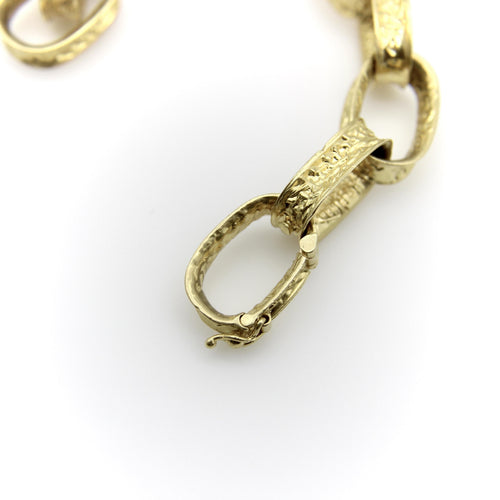 Bracelet Bracelet vintage à maillons ovales en or jaune 18 carats 58 Facettes A1001C