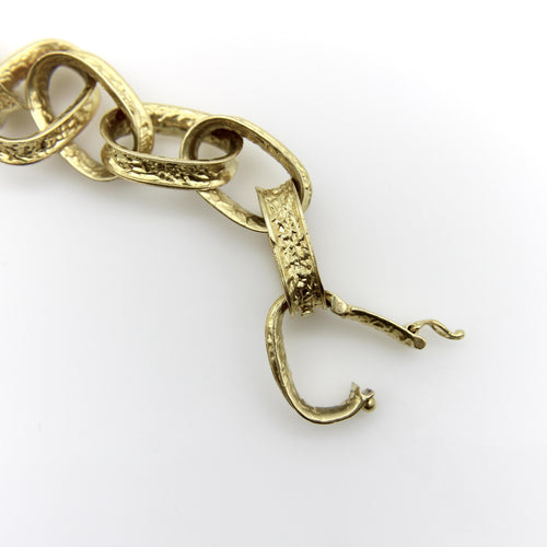 Bracelet Bracelet vintage à maillons ovales en or jaune 18 carats 58 Facettes A1001C