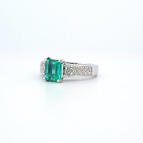 Bague 56 Bague en or blanc 18 ct avec émeraude et diamants 58 Facettes
