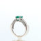 Bague 56 Bague en or blanc 18 ct avec émeraude et diamants 58 Facettes