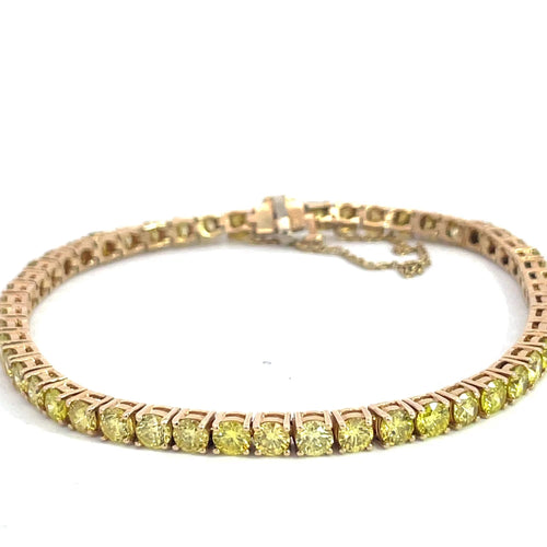 Bracelet Bracelet tennis en or jaune 14 carats et diamants fancy yellow 58 Facettes UN0134