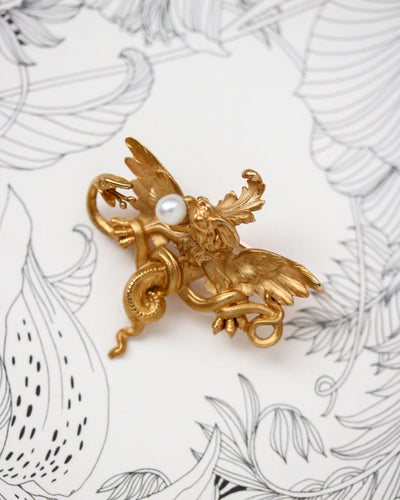 Pendentif Broche pendentif chimère en or jaune 750 et perle fine 58 Facettes A11949