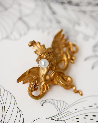 Pendentif Broche pendentif chimère en or jaune 750 et perle fine 58 Facettes A11949