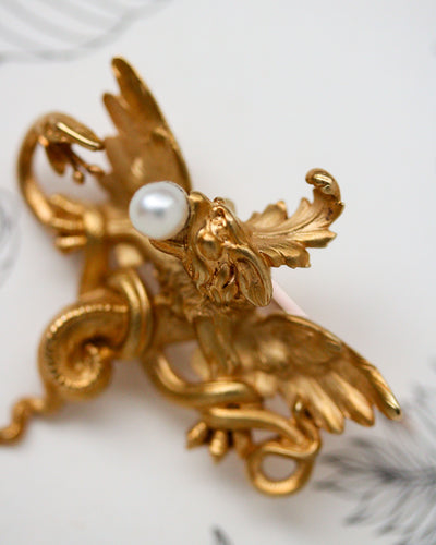 Pendentif Broche pendentif chimère en or jaune 750 et perle fine 58 Facettes A11949