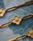 Collier Sautoir - Chaîne en or jaune 750 à maille fleur 58 Facettes A11993