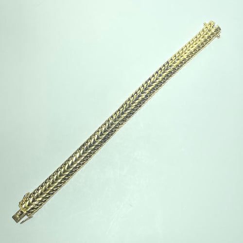 Montre Bracelet maille américaine en or jaune 18 carats 19,63 g 58 Facettes 260071
