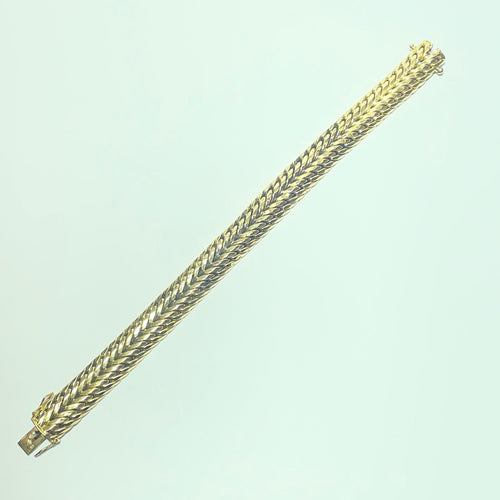 Montre Bracelet maille américaine en or jaune 18 carats 19,63 g 58 Facettes 260071