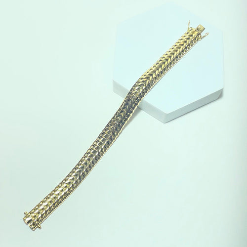 Montre Bracelet maille américaine en or jaune 18 carats 19,63 g 58 Facettes 260071