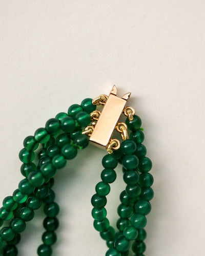 Collier Collier quatre rangs de perles d’émeraude en or jaune 18 ct 58 Facettes A11960
