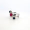 Bague 57 Bague - Or blanc 18 K avec rubis et diamants 58 Facettes