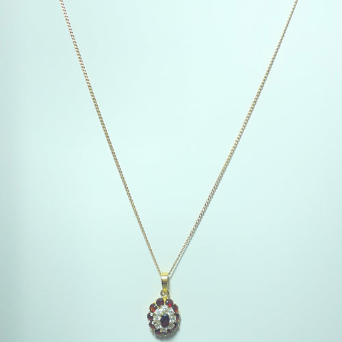Pendentif Pendentif rosace - Or jaune 18 carats et pierres rouges et blanches 58 Facettes 260097