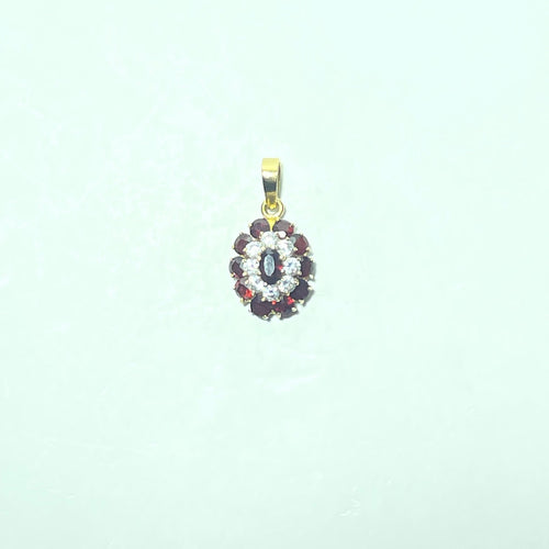 Pendentif Pendentif rosace - Or jaune 18 carats et pierres rouges et blanches 58 Facettes 260097