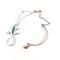 Collier Collier et pendentif lézard en or blanc 18 ct, émeraudes et diamants 58 Facettes