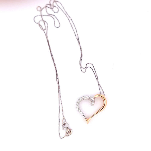 Collier Collier - Chaîne en or blanc avec pendentif cœur en or jaune et blanc diamants 58 Facettes