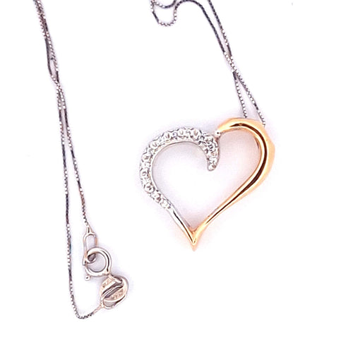 Collier Collier - Chaîne en or blanc avec pendentif cœur en or jaune et blanc diamants 58 Facettes