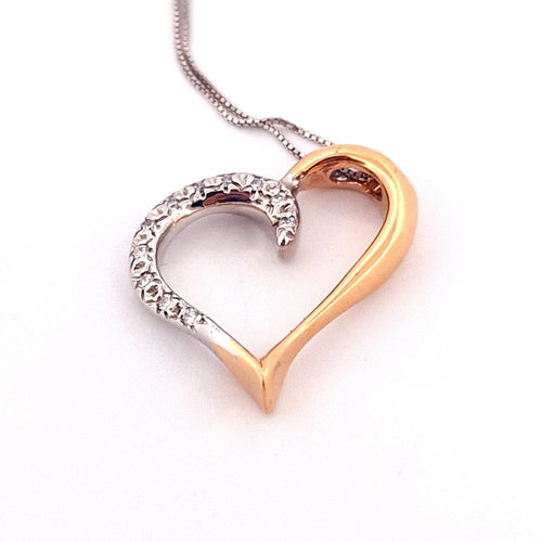 Collier Collier - Chaîne en or blanc avec pendentif cœur en or jaune et blanc diamants 58 Facettes