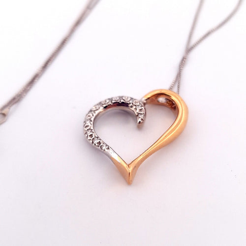 Collier Collier - Chaîne en or blanc avec pendentif cœur en or jaune et blanc diamants 58 Facettes