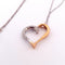 Collier Collier - Chaîne en or blanc avec pendentif cœur en or jaune et blanc diamants 58 Facettes