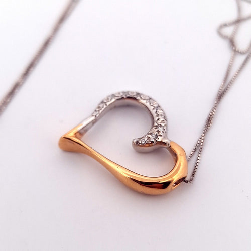 Collier Collier - Chaîne en or blanc avec pendentif cœur en or jaune et blanc diamants 58 Facettes