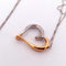 Collier Collier - Chaîne en or blanc avec pendentif cœur en or jaune et blanc diamants 58 Facettes