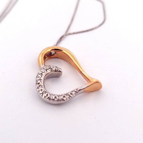 Collier Collier - Chaîne en or blanc avec pendentif cœur en or jaune et blanc diamants 58 Facettes
