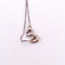 Collier Collier - Chaîne en or blanc avec pendentif cœur en or jaune et blanc diamants 58 Facettes