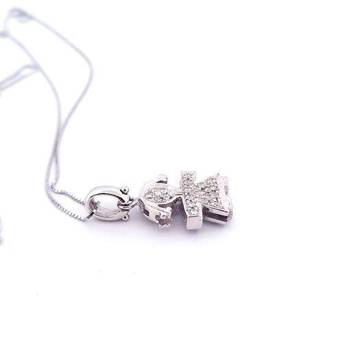 Collier Collier avec pendentif fillette en or blanc 18 kt et diamants 58 Facettes